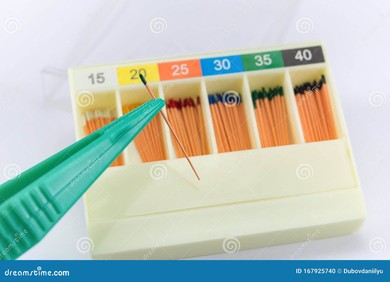 gutta-percha pins in a set of different sizes for root canal filling