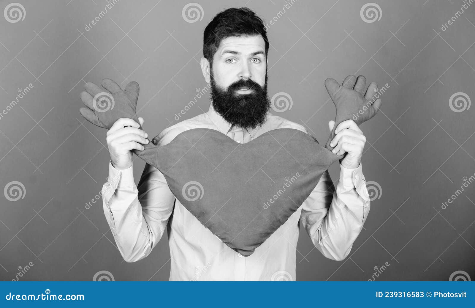 guy with beard and mustache in love romantic mood. feeling love. dating and relations concept. happy in love. physical