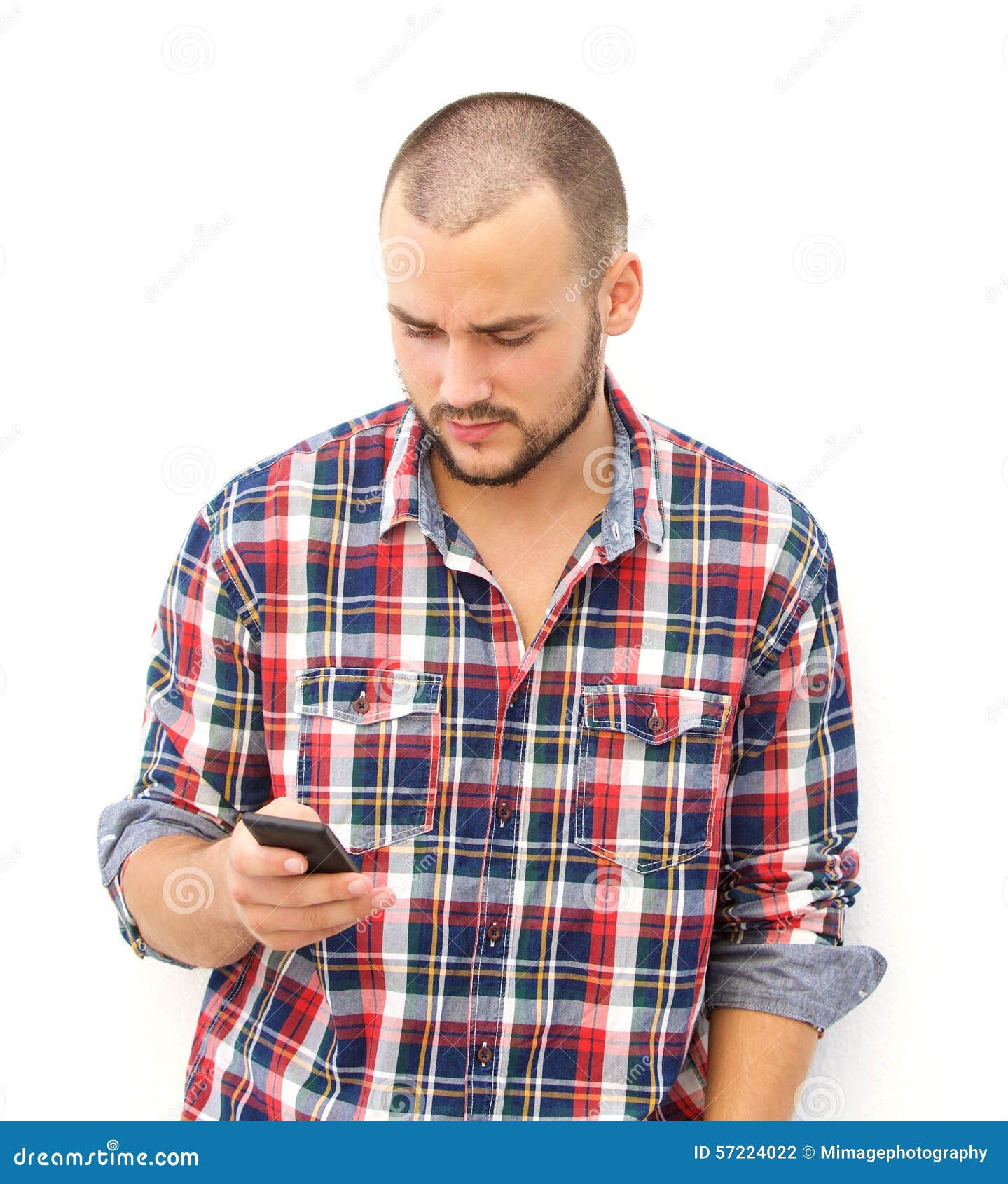 Guy with Beard Searching His Smart Phone for a Number Stock Photo