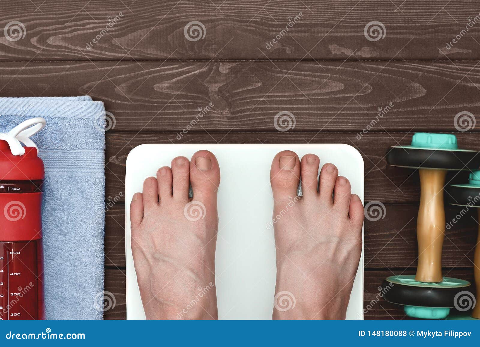 Bare feet standing on a scales. Lose weight concept with person on a scale  measuring kilograms. Weight Scale, Underweight man on Scale Stock Photo -  Alamy