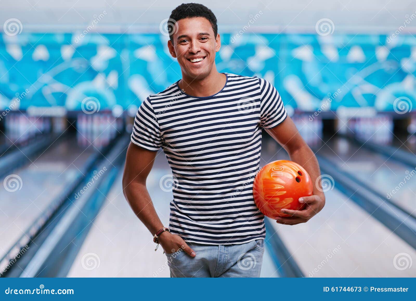 Guy with bowling ball stock image. Image of looking, activity 61744673