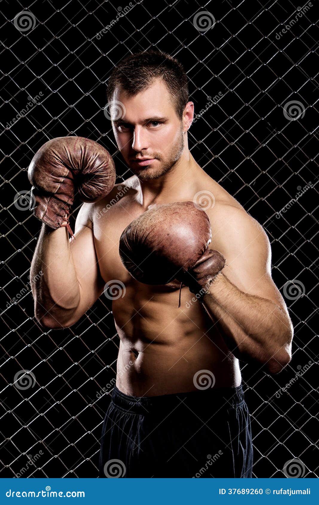 Guy with a boxing gloves stock photo. Image of dark, healthy - 37689260