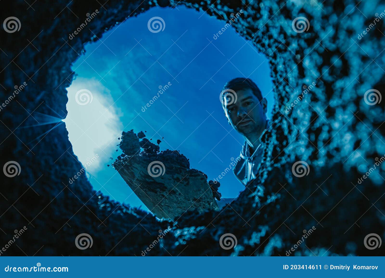 Guy Is Digging And Shoveling Deep Hole Or Grave On Dark Night. Digger