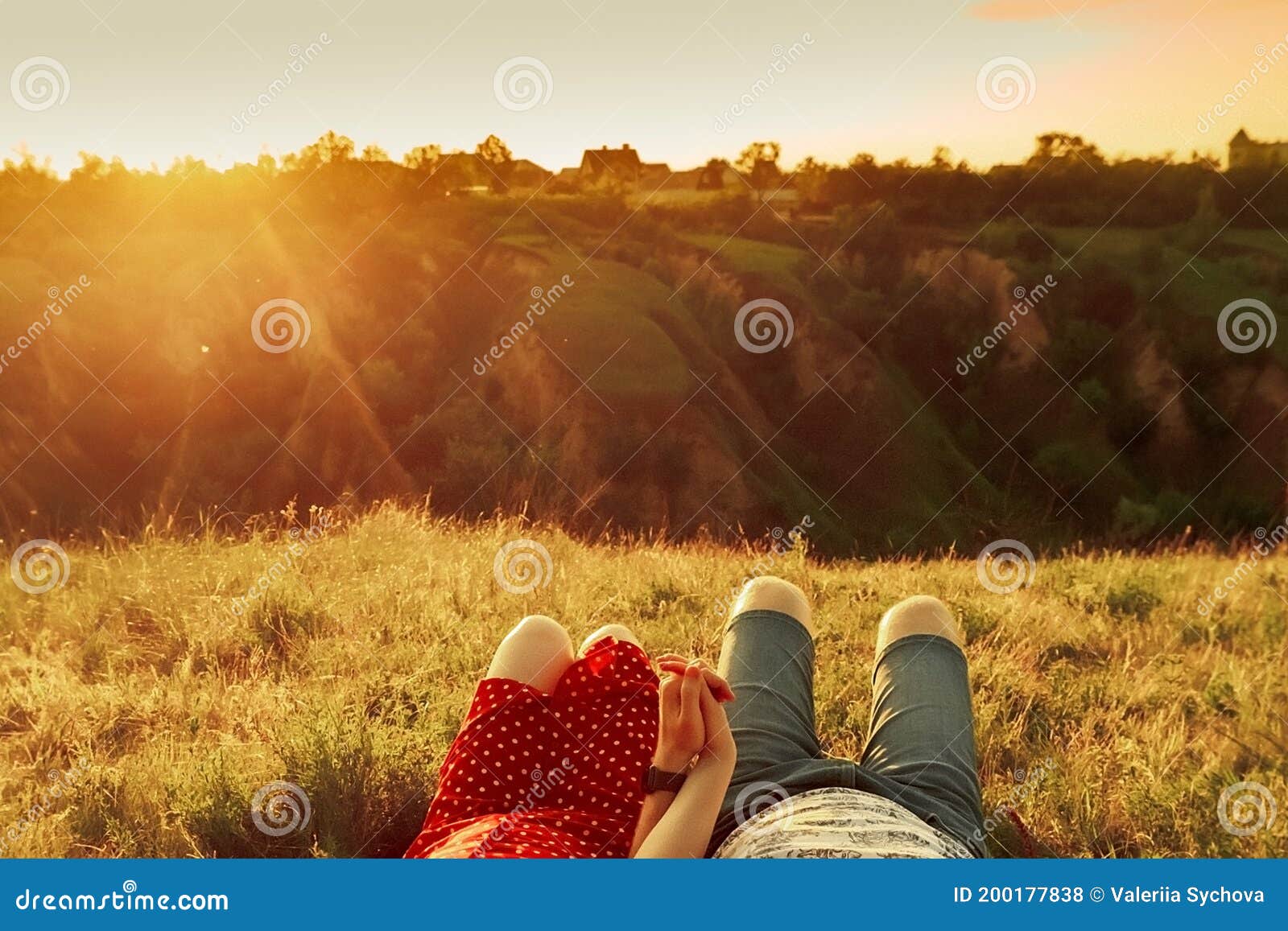 Guy and Girl Lie on the Grass, Top View. Romantic Date at Sunset in a ...
