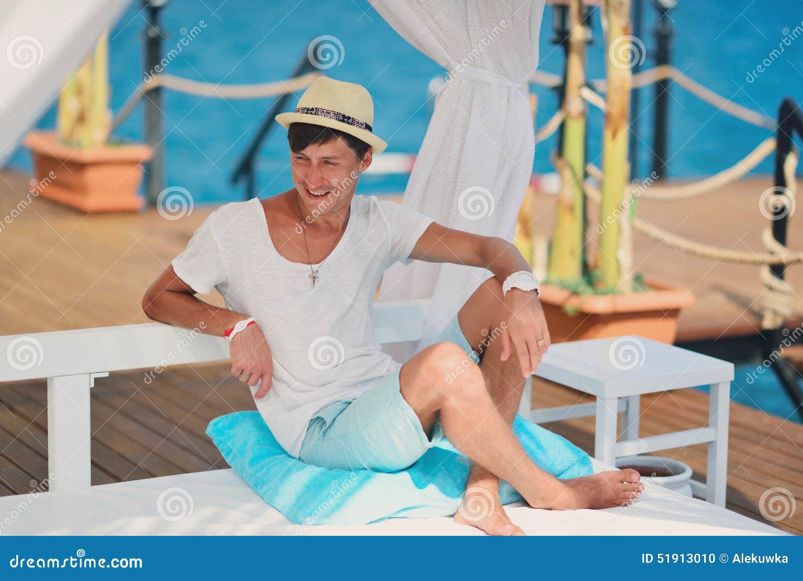 The Guy in the Hat Under a Canopy Stock Photo Image of lifestyle