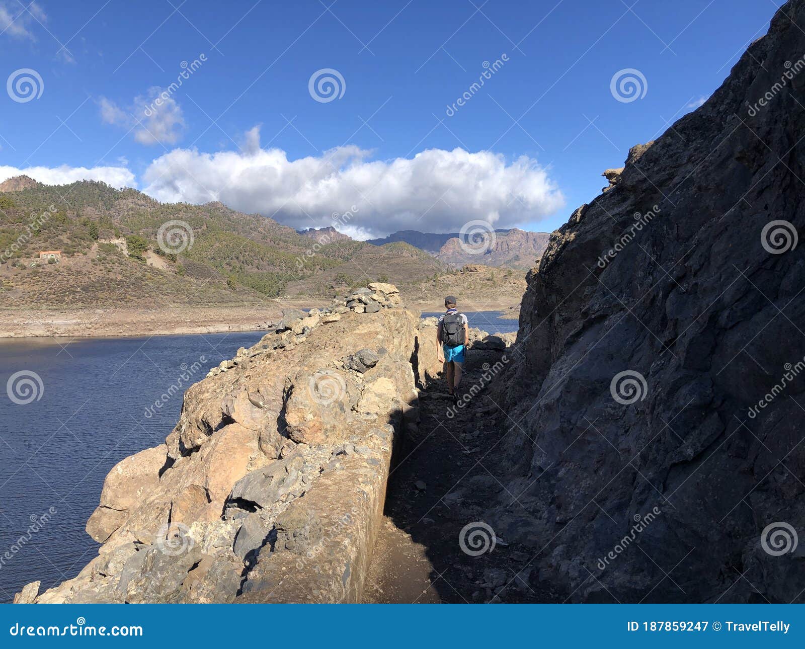 guy hiking around las ninas reservoir