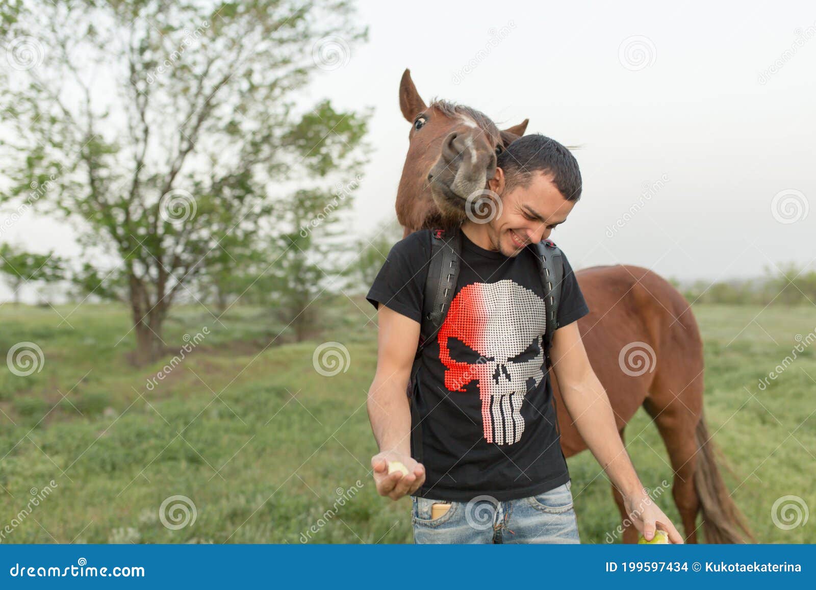 Guy with a Horse in a Green Field. Communication with Animals Stock Photo -  Image of lifestyle, cheerful: 199597434