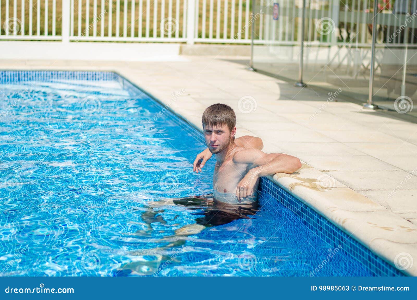 The guy in the pool stock image. Image of pool, blue 98985063