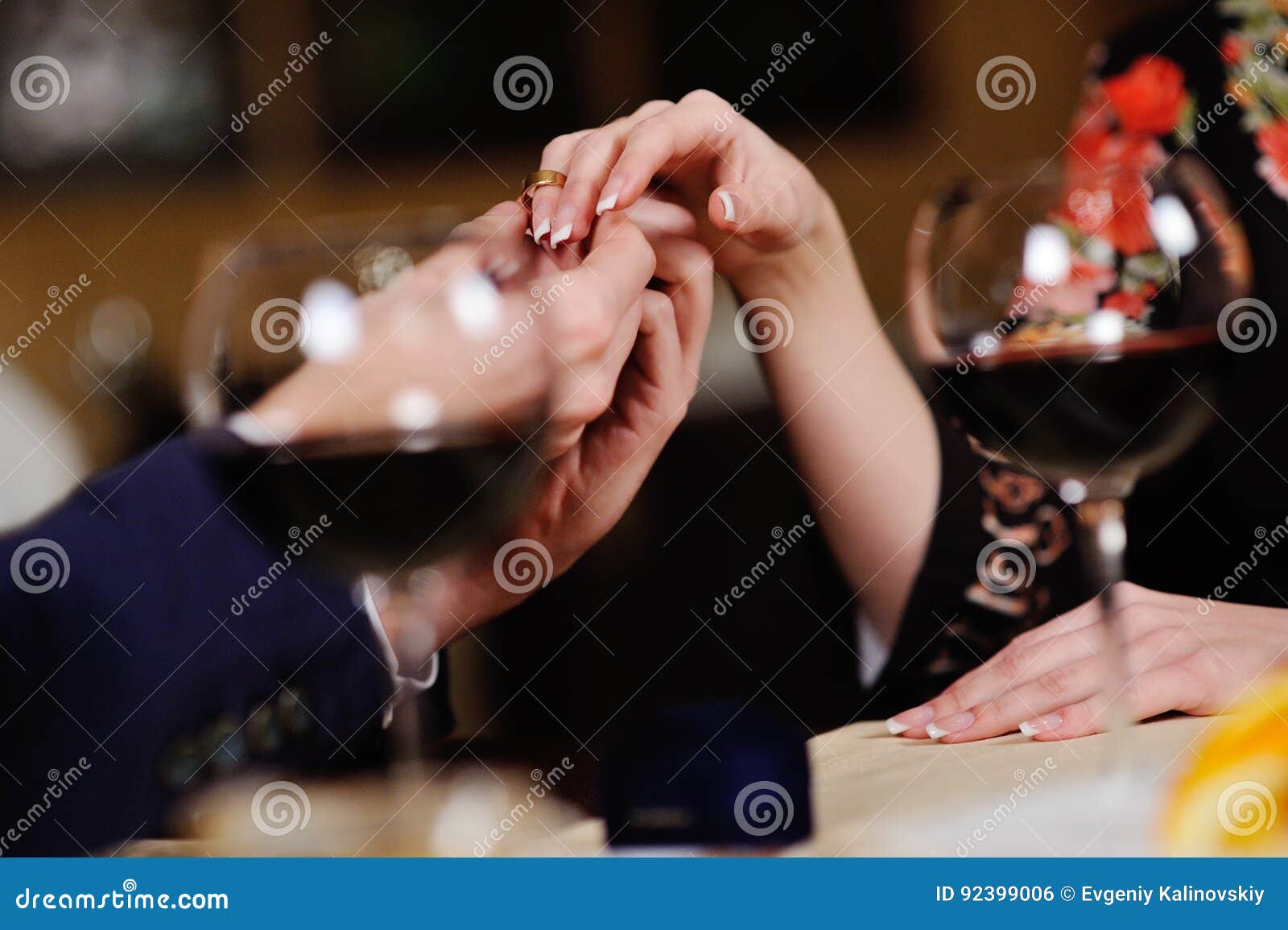 Guy Puts on the Girl an Engagement Ring. Stock Photo Image of gold