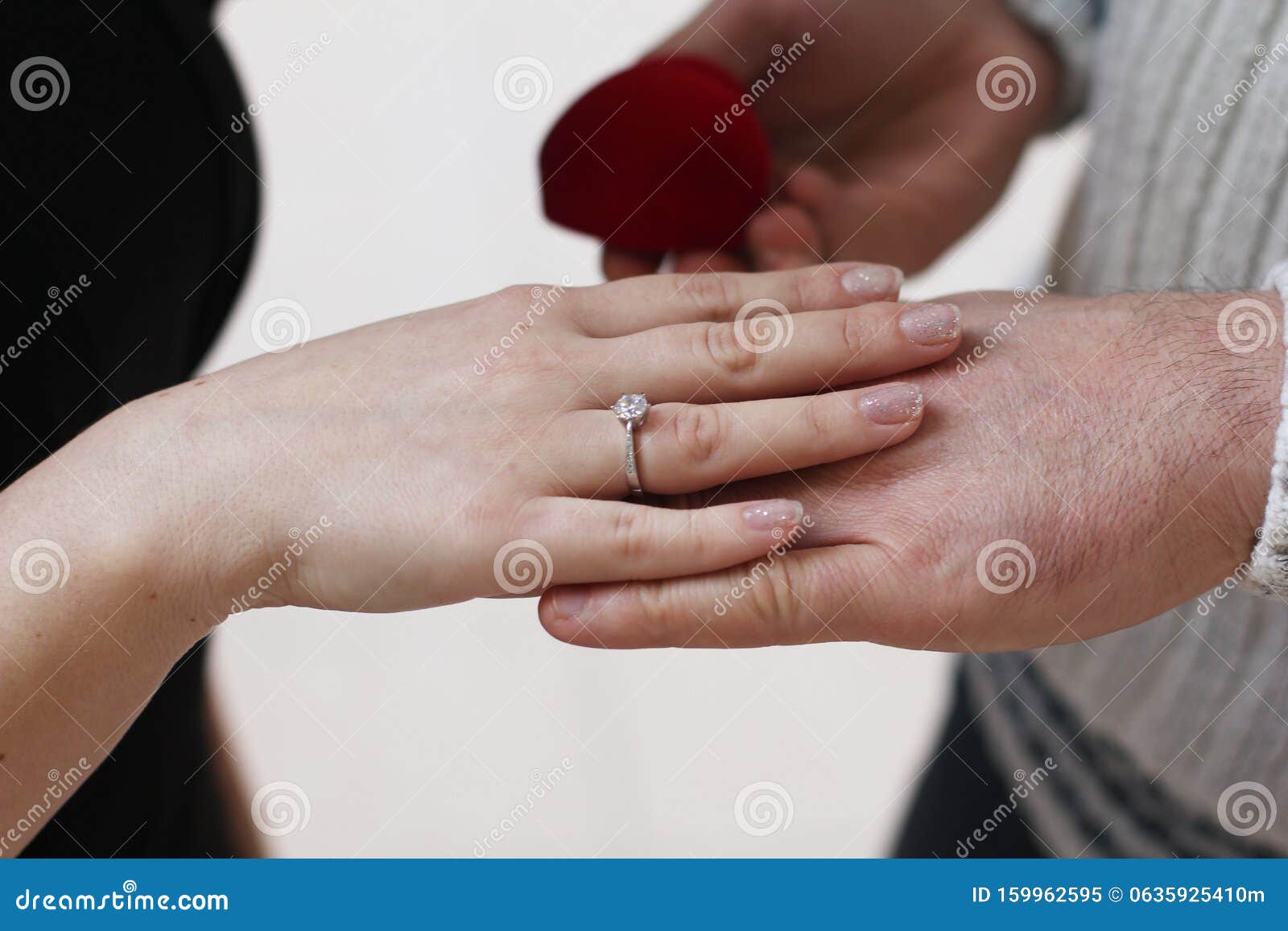 Guy Puts a Wedding Ring on a Girl Stock Image Image of jewelry, rings