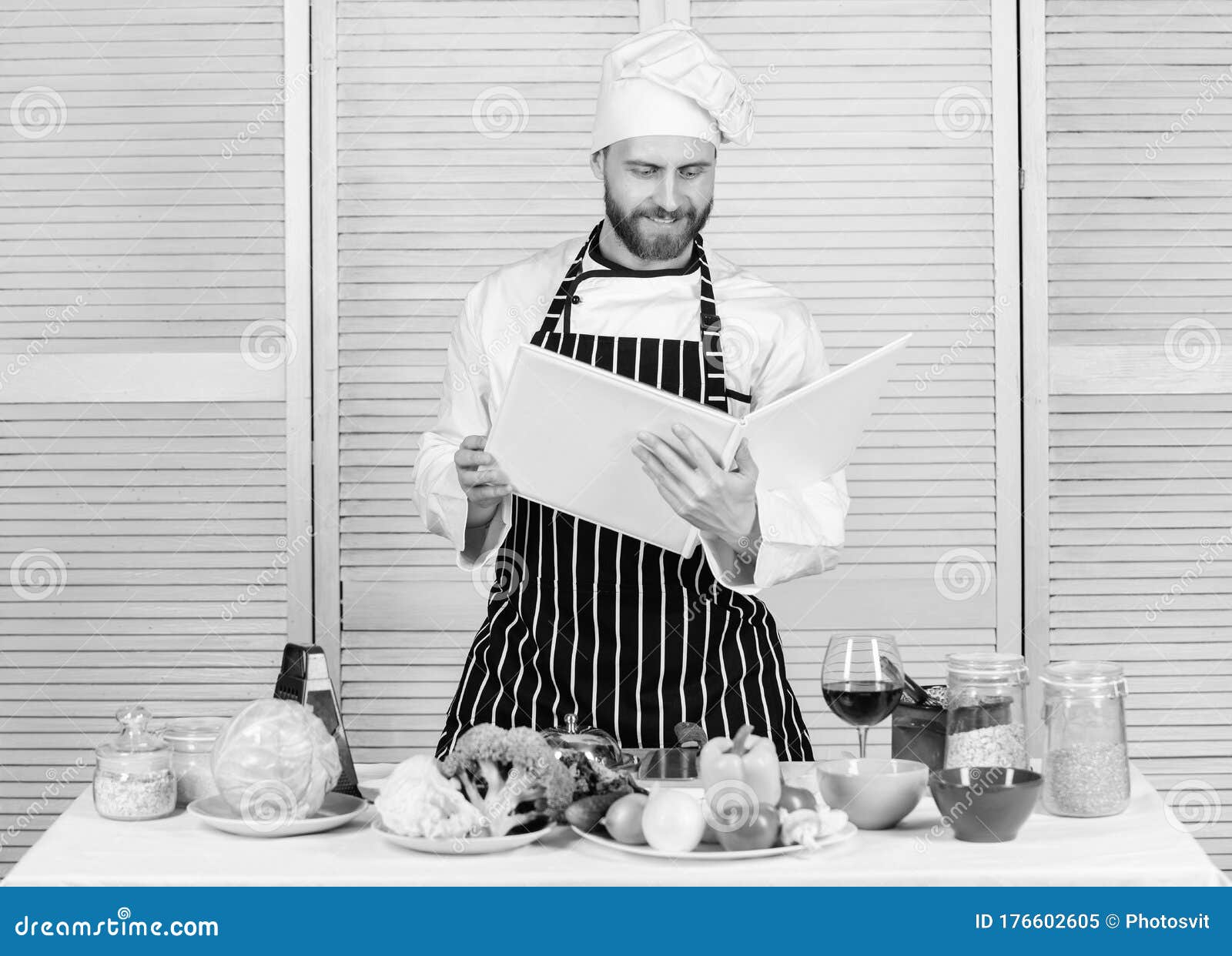 guy read book recipes. culinary arts concept. man learn recipe. improve cooking skill. book family recipes. ultimate
