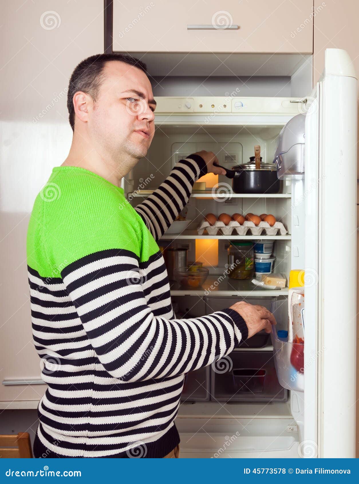 Guy Searching for Something in Refrigerator Stock Photo Image of