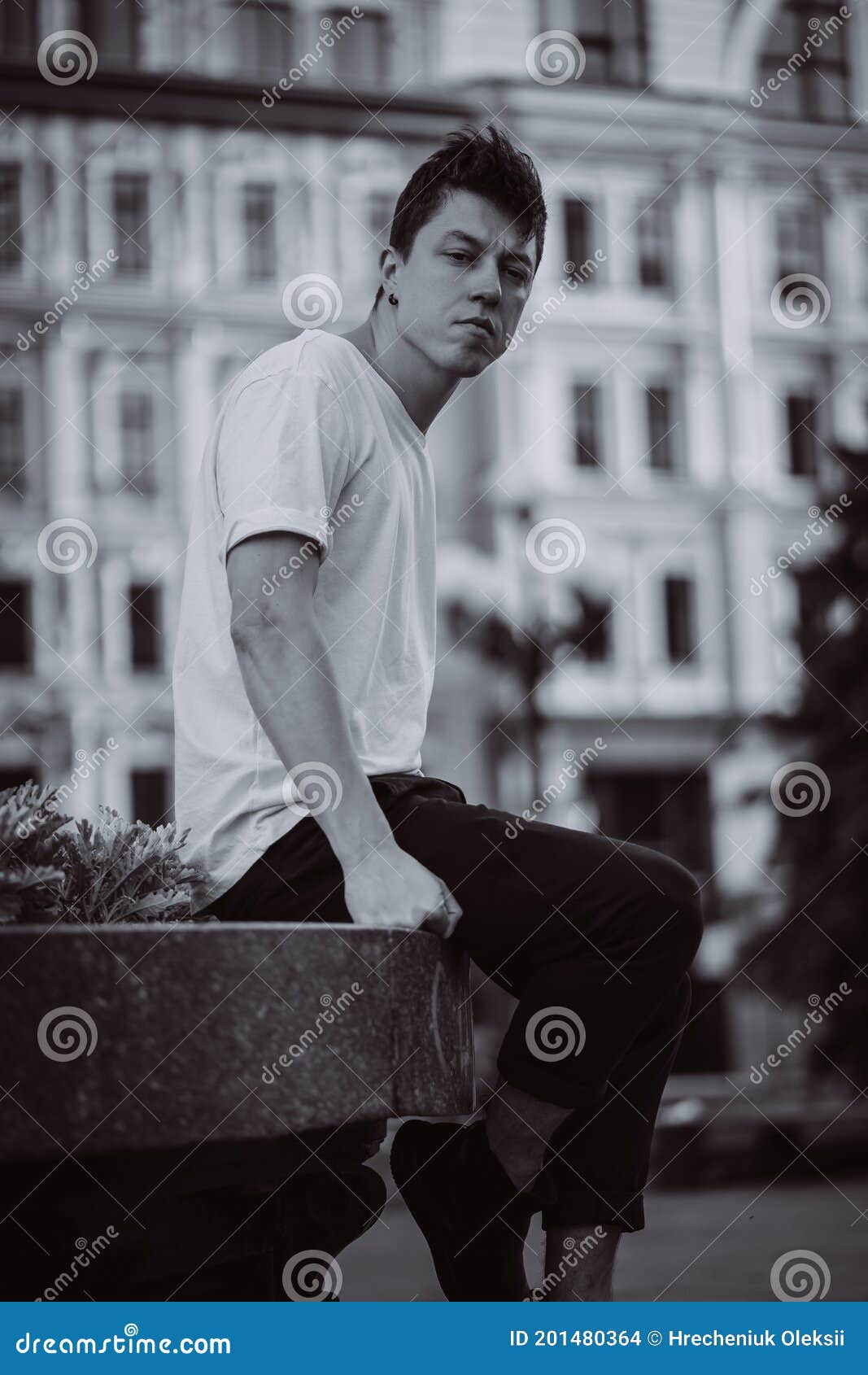 Guy Sitting on the City Street, Look Camera and Around Stock Photo ...