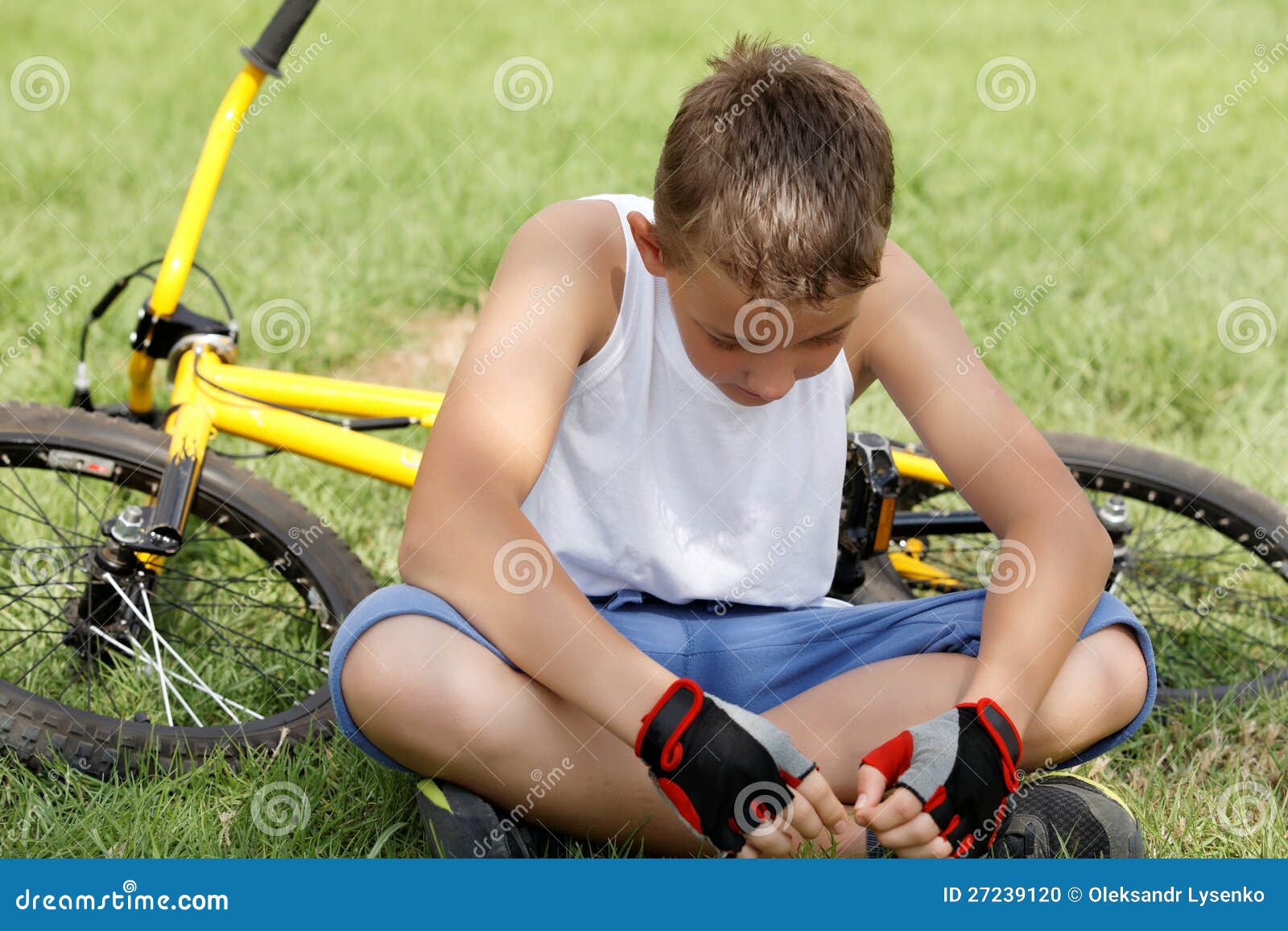 The Guy Sitting Next To the Bike Outside Stock Photo Image of