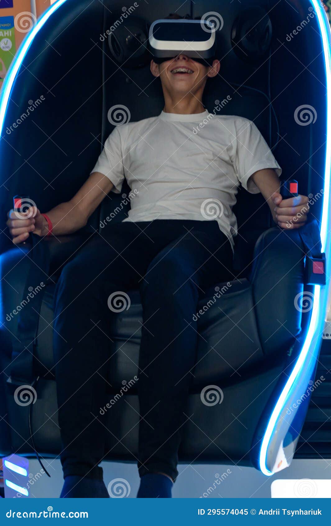 A Guy is Sitting on a Ride with Vr Glasses, Stock Image Image of