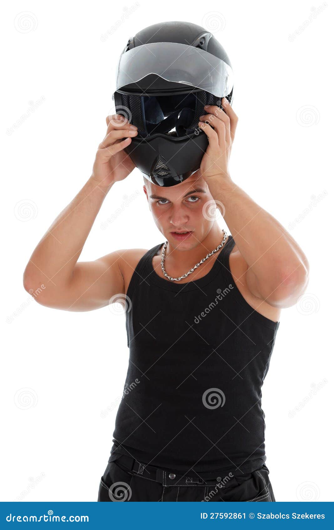 Guy Taking Off His Helmet Stock Image 27592861