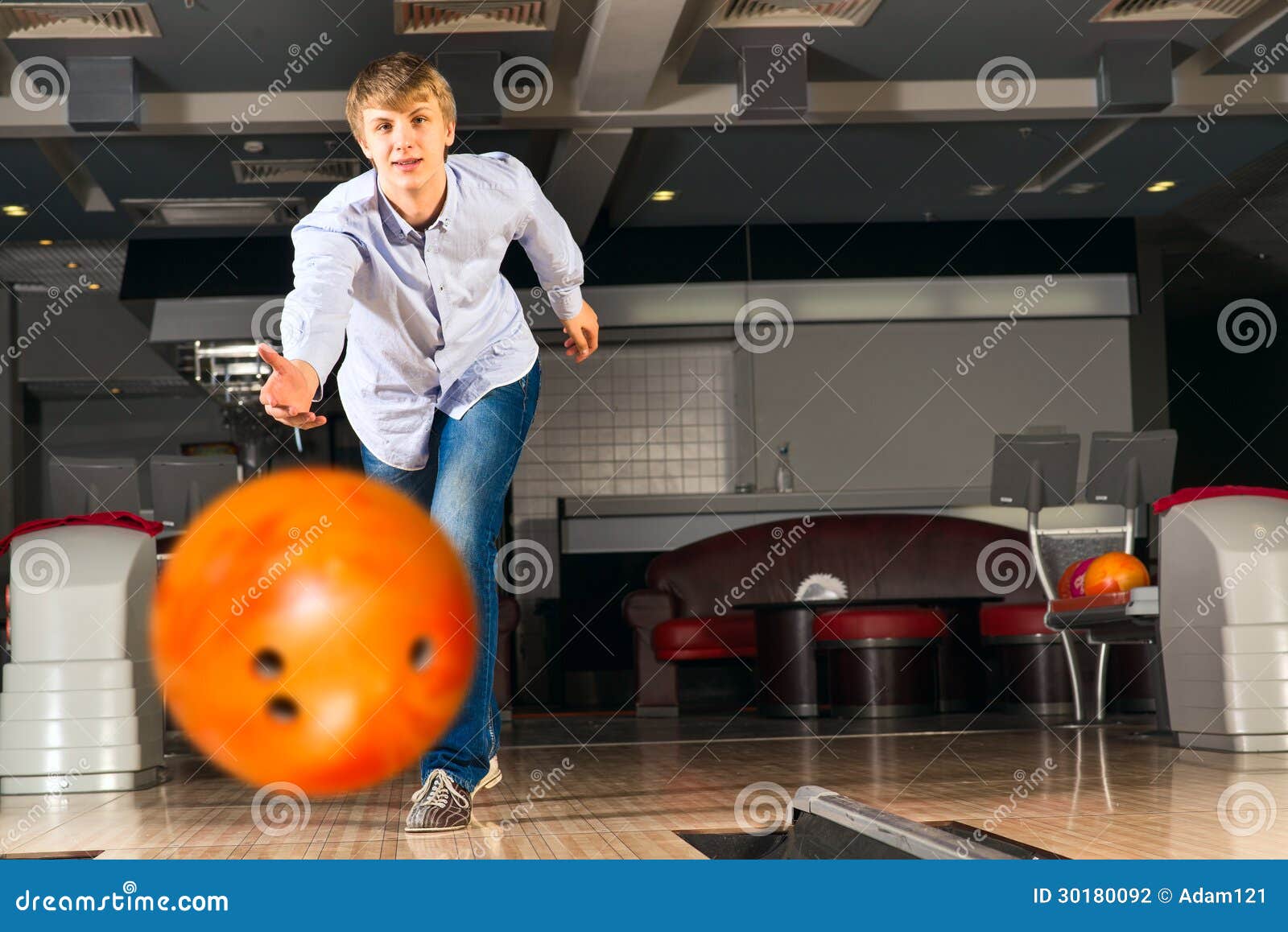 Young man playing bowling stock photo. Image of bowling 30180092