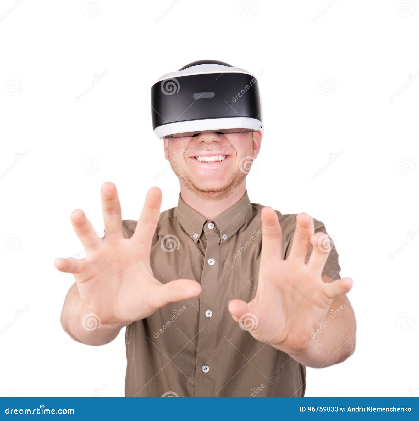 A Guy Trying To Touch Or Embrace With Hands Virtual Objects In A Digital Simulation. A Young Man