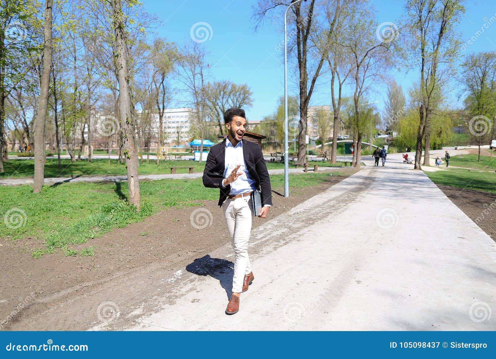 Arabian Walking In Park And Smiling In Slow Motion Stock - 