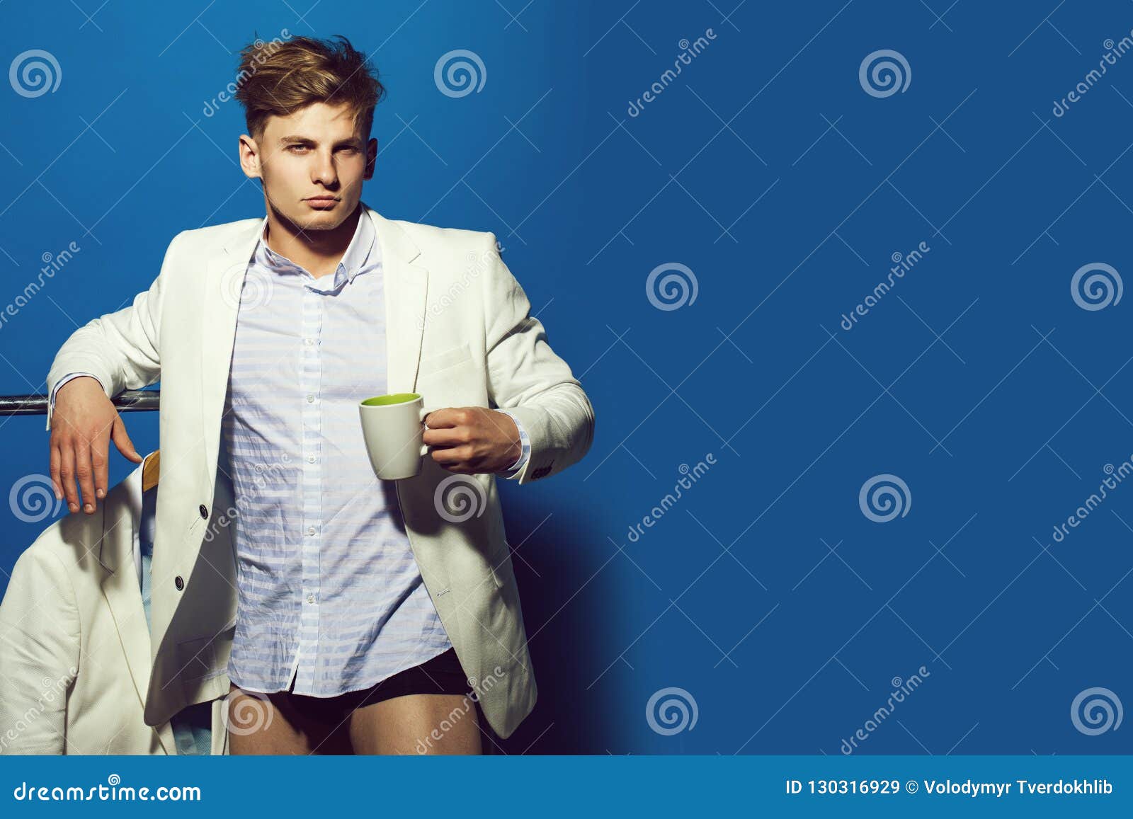 Guy in Wardrobe on Blue Background. Stock Image - Image of wardrobe ...