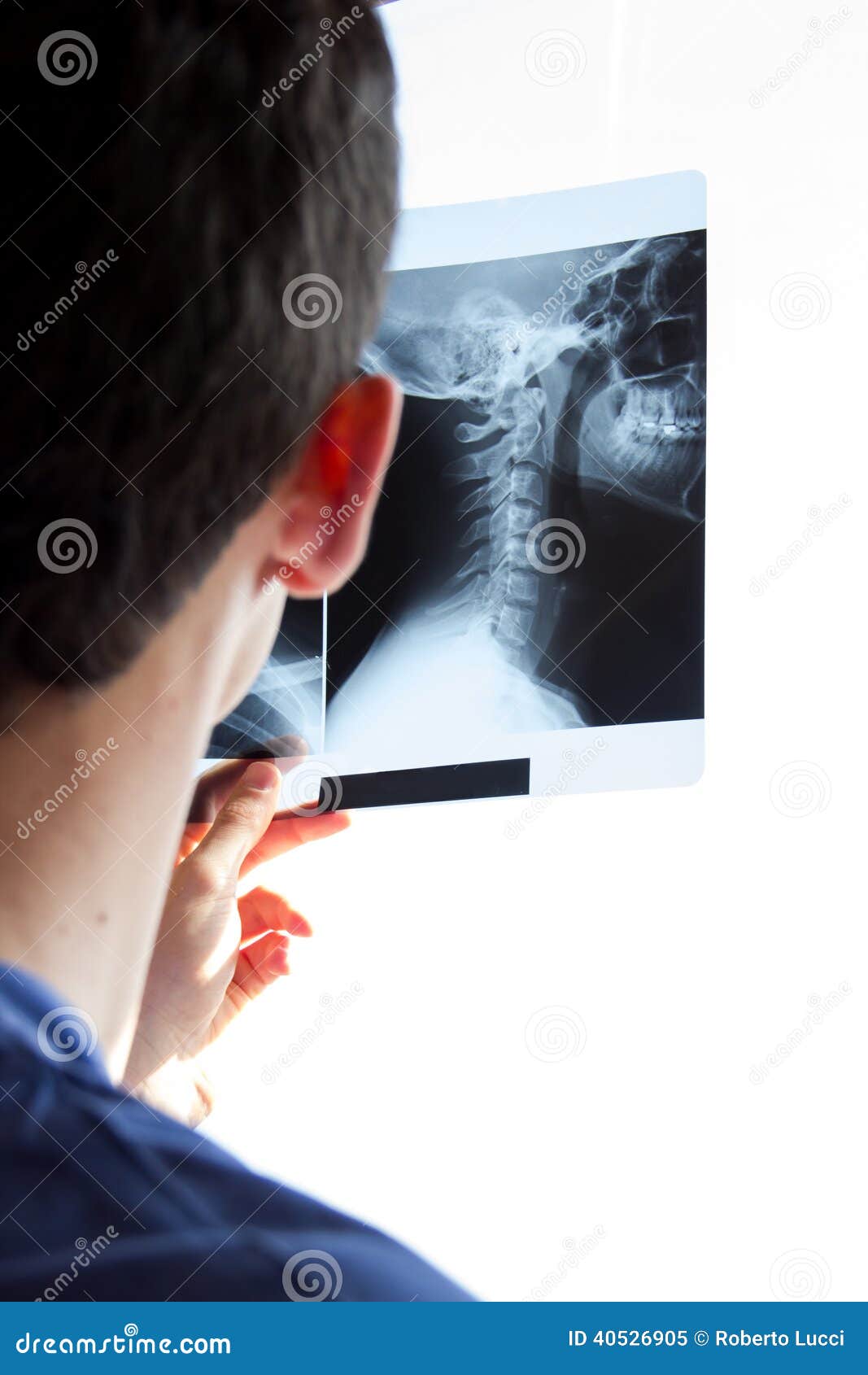 guy watching neck radiogram