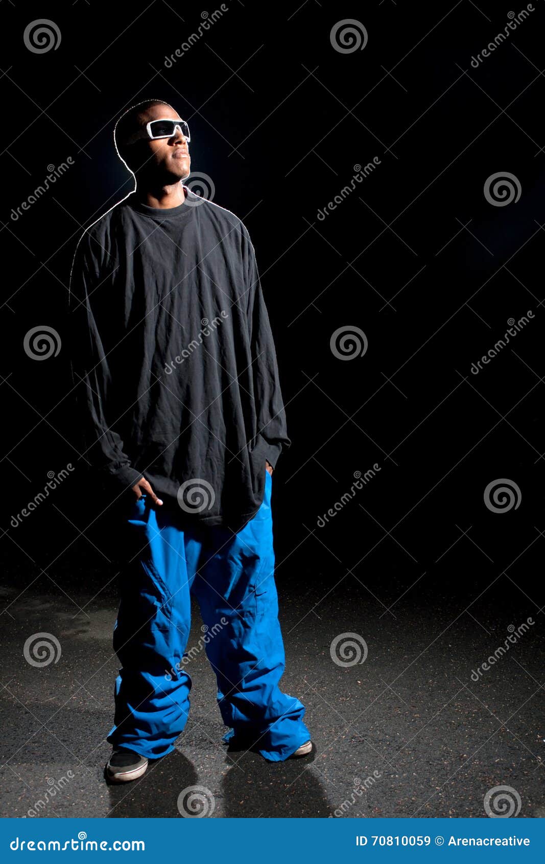 https://thumbs.dreamstime.com/z/guy-wearing-baggy-clothes-african-american-young-man-winter-sports-clothing-posing-under-dramatic-lighting-lens-flare-70810059.jpg