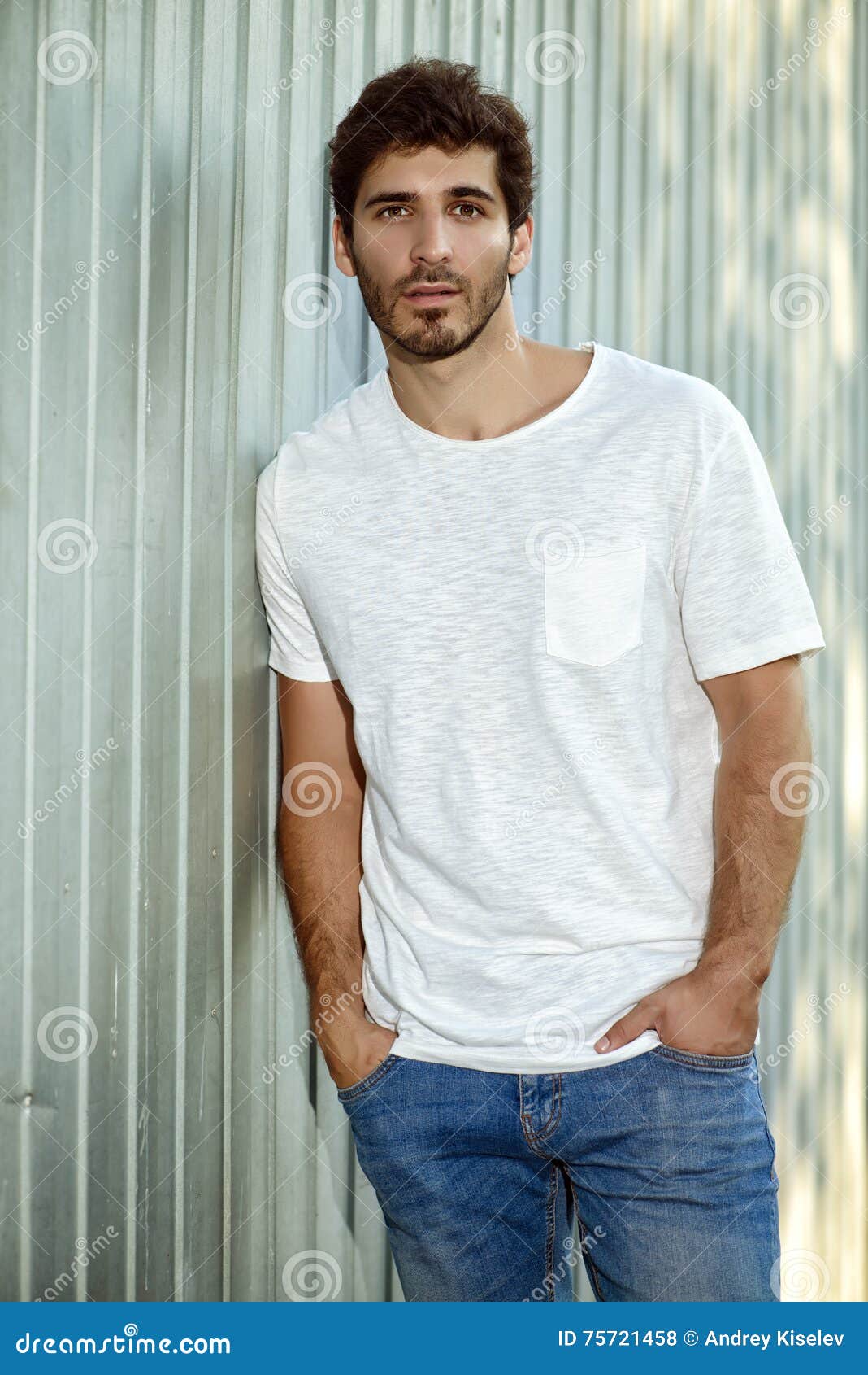 Guy by a white fence stock photo. Image of natural, calm - 75721458