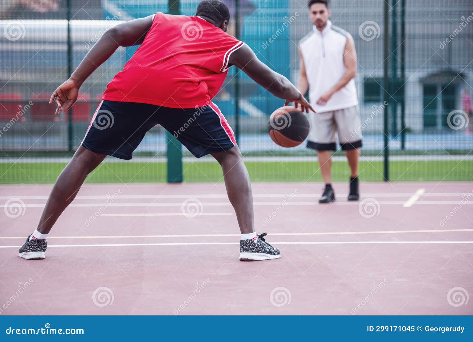 Guys playing basketball stock image. Image of exercise - 299171045