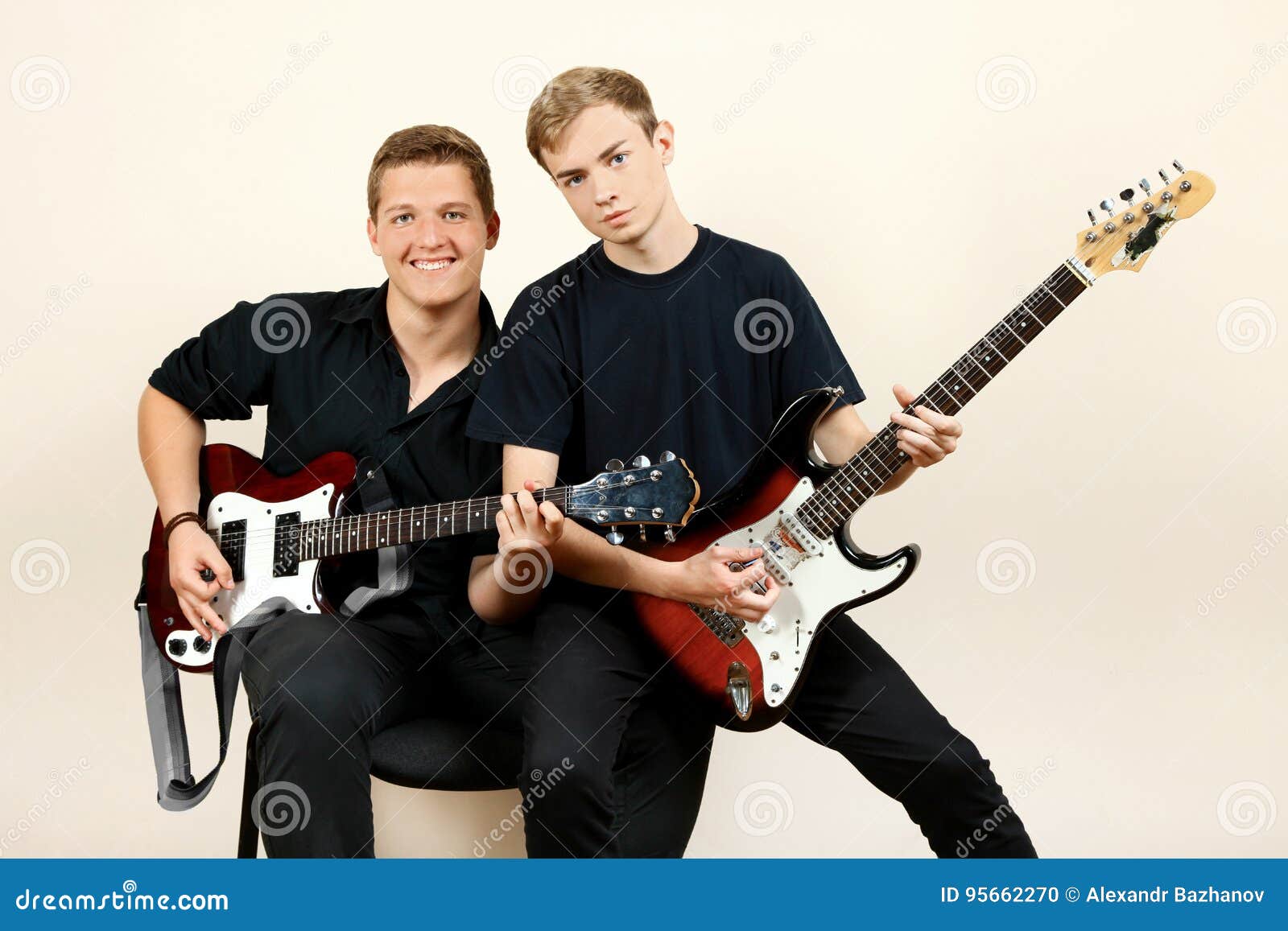Guys Playing Electric Guitars Stock Photo Image of student, studio