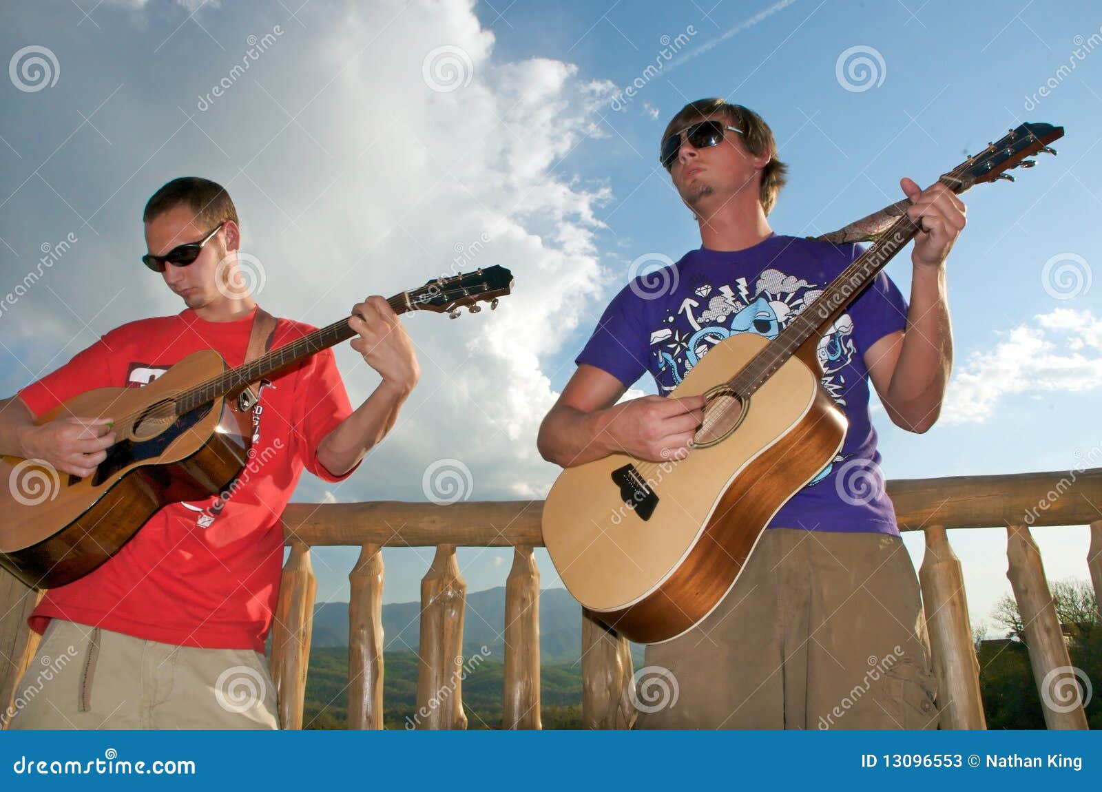 Guys Playing Guitar stock image. Image of friend, looking 13096553