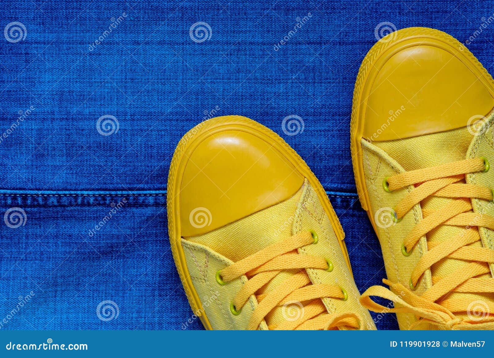 Gym Shoes Against the Background of Jeans Stock Photo - Image of jeans ...