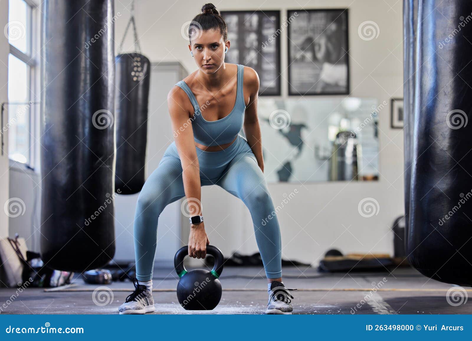 Gym Woman Weightlifting Kettlebell And Focus For Fitness Health And Training In Crossfit