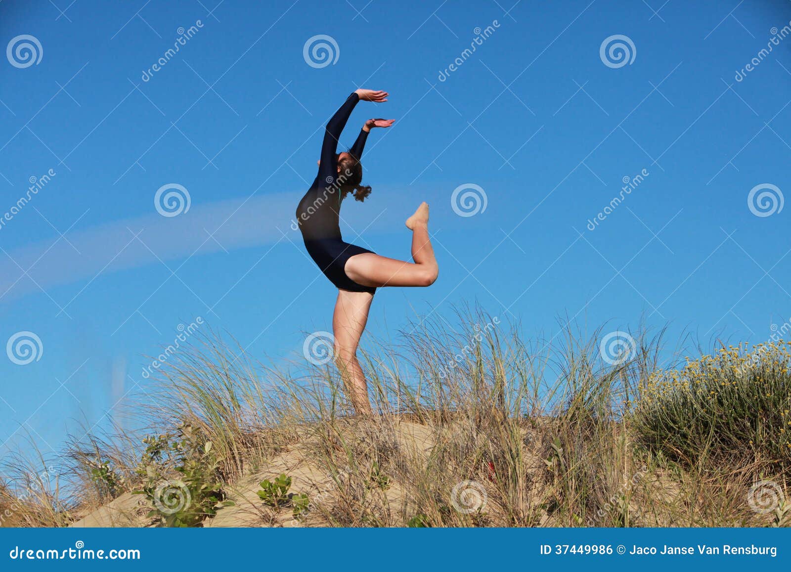 Gymnast Arching Her Back on the Beach Stock Photo Image of athlete