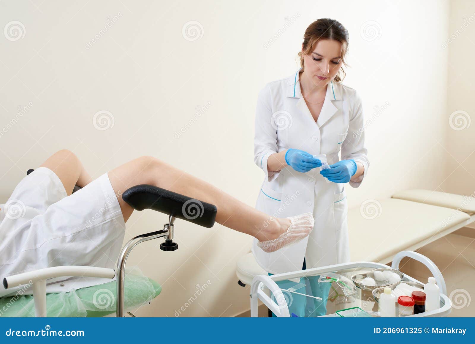 Gynaecologist Examining A Patient Sitting On Gynecological Chair Stock Image Image Of Medical