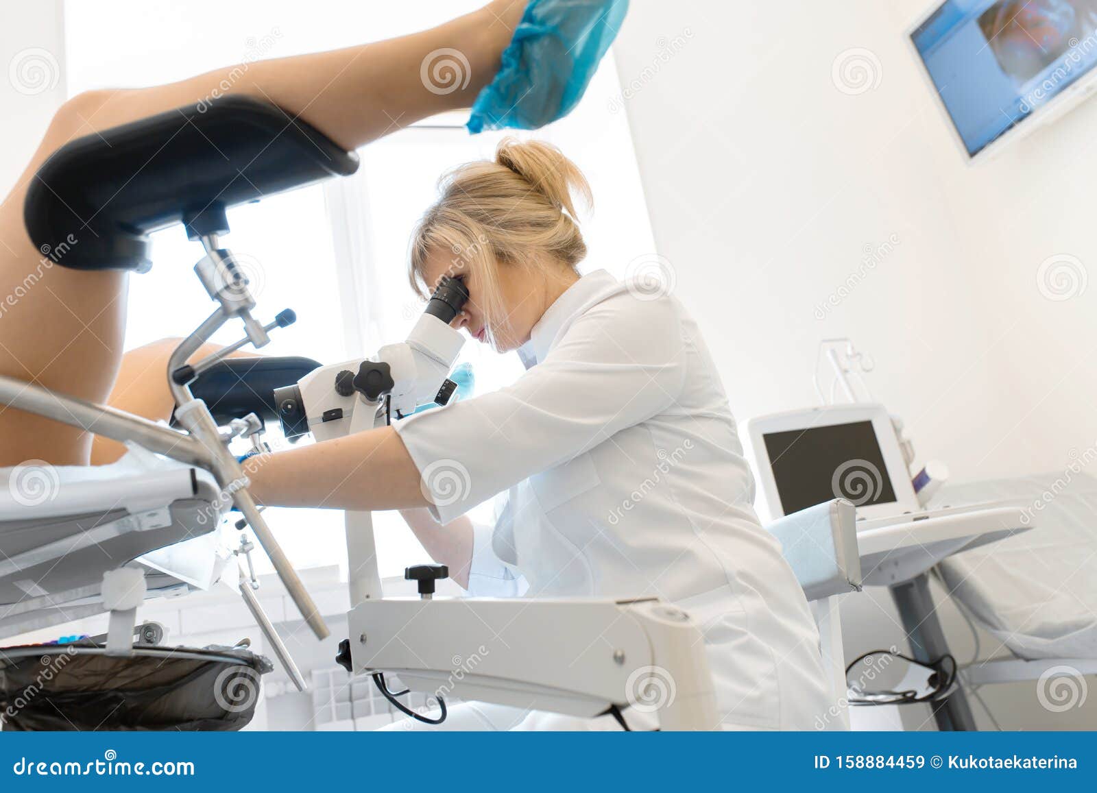 A Gynecologist Examines A Pregnant Woman During A Covid Pandemic