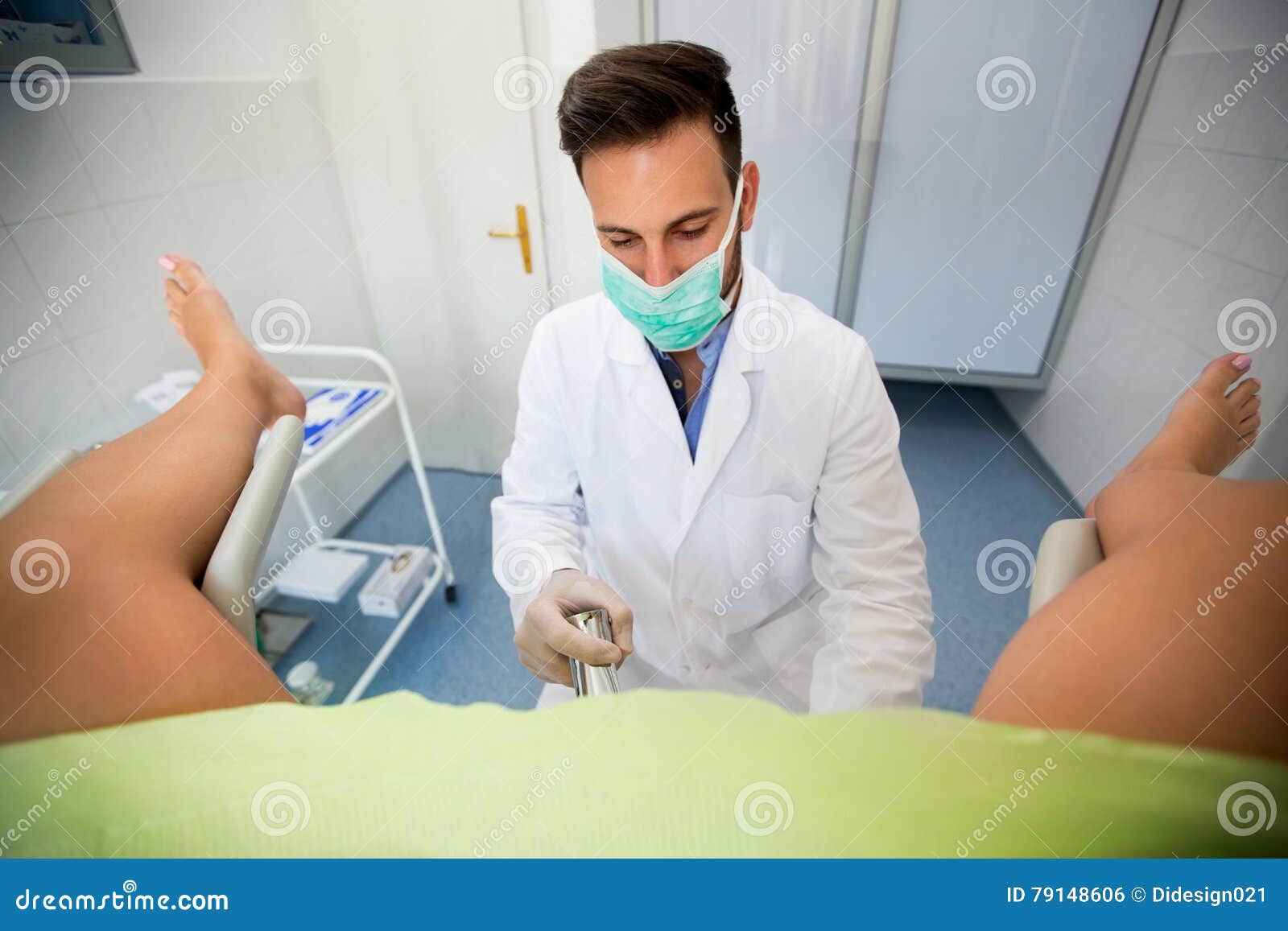gynecologist examining a patient