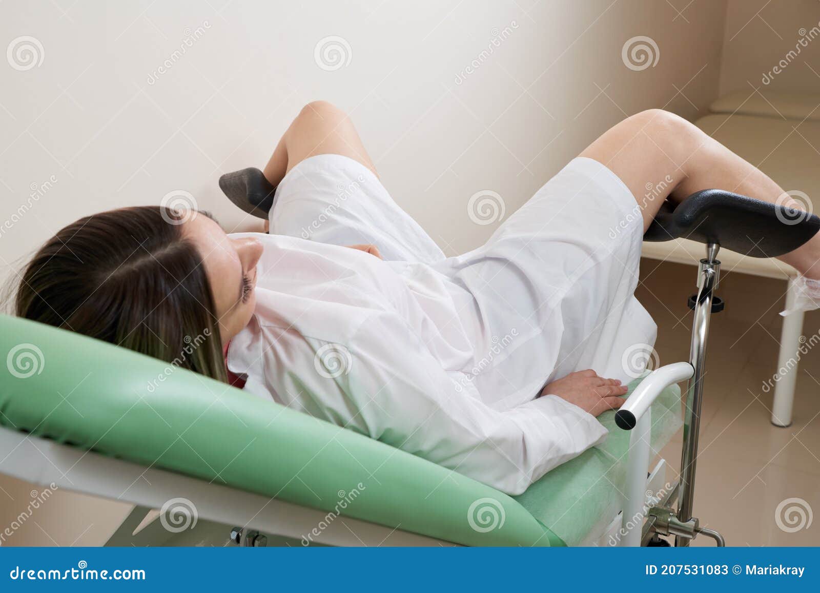 Gynaecologist Examining A Patient Sitting On Gynecological Chair Stock Image Image Of Cabinet