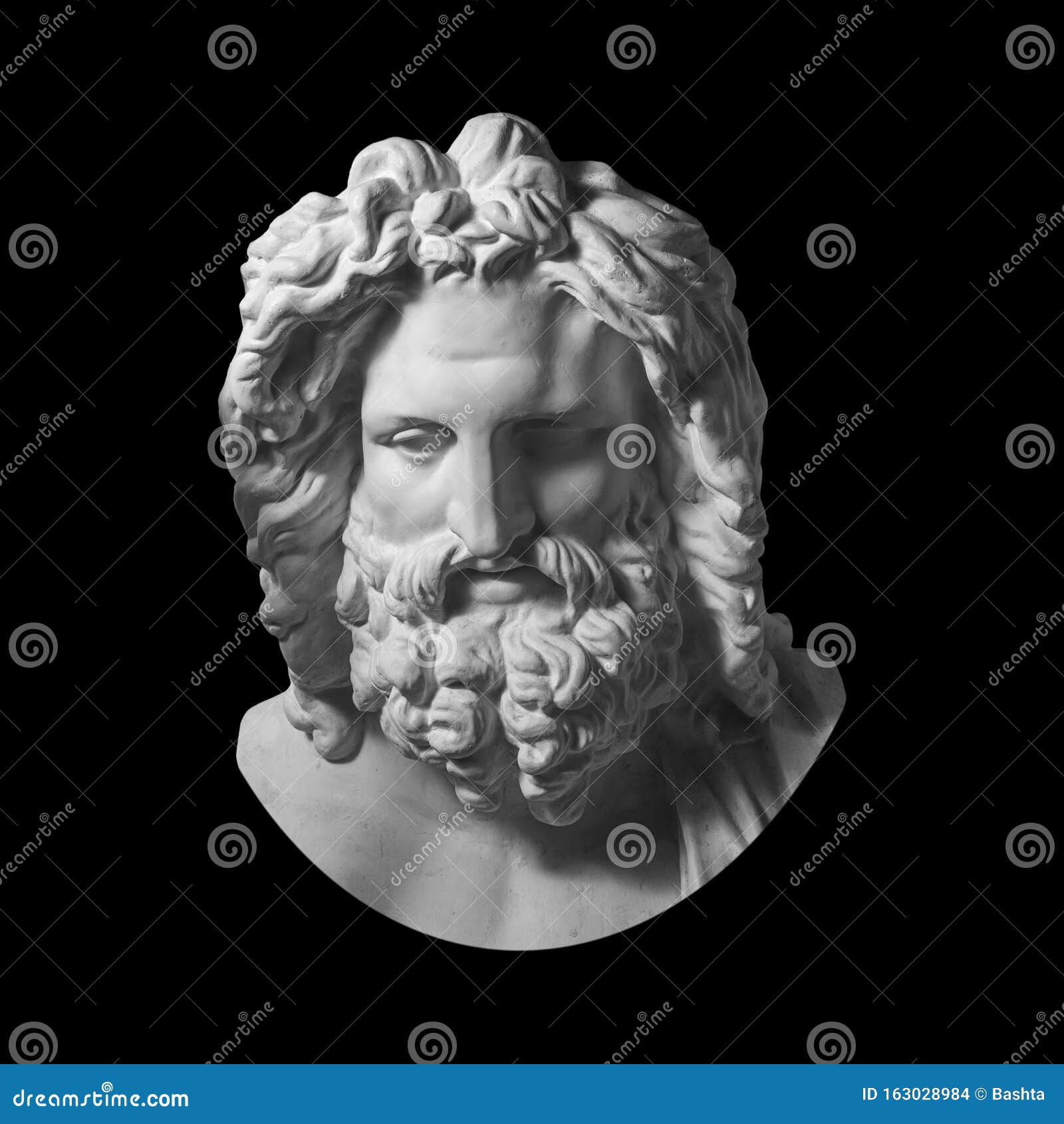 gypsum copy of antique statue zeus head  on black background. plaster sculpture man face with beard.