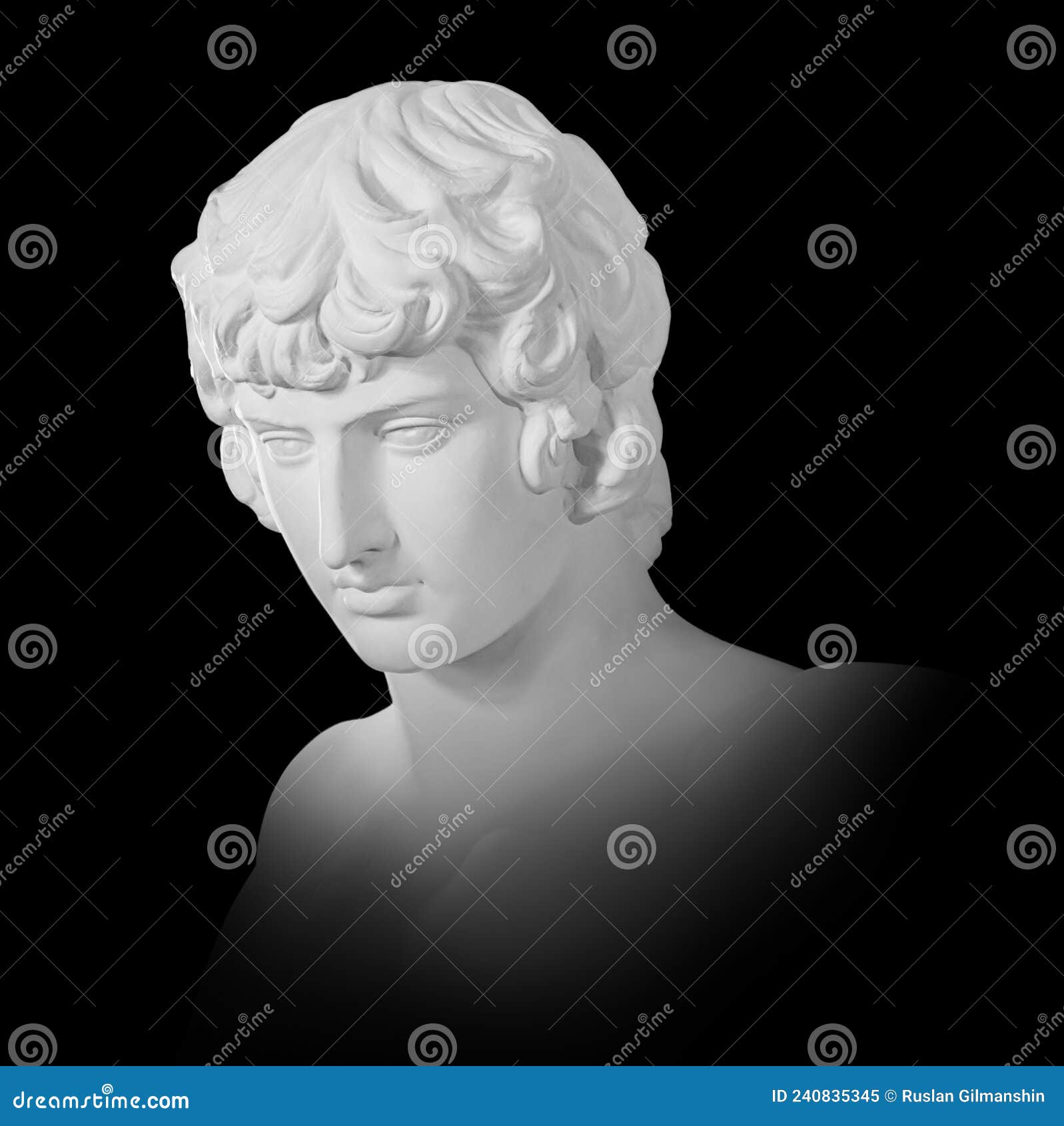 gypsum copy of famous ancient statue antinous bust  on a black background with clipping path. plaster antique