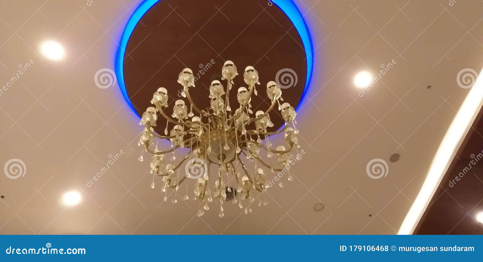 The Gypsum False Ceiling with Circle Wooden Ceiling and Chandelier ...