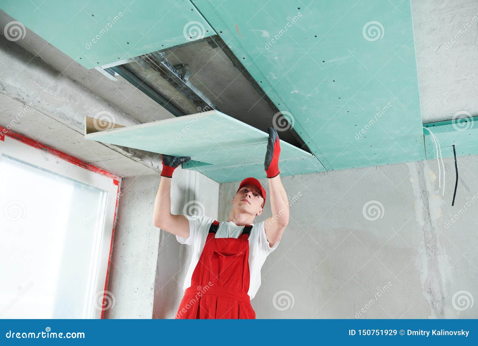 Gypsum Plasterboard Construction Work At Suspended Ceiling Stock