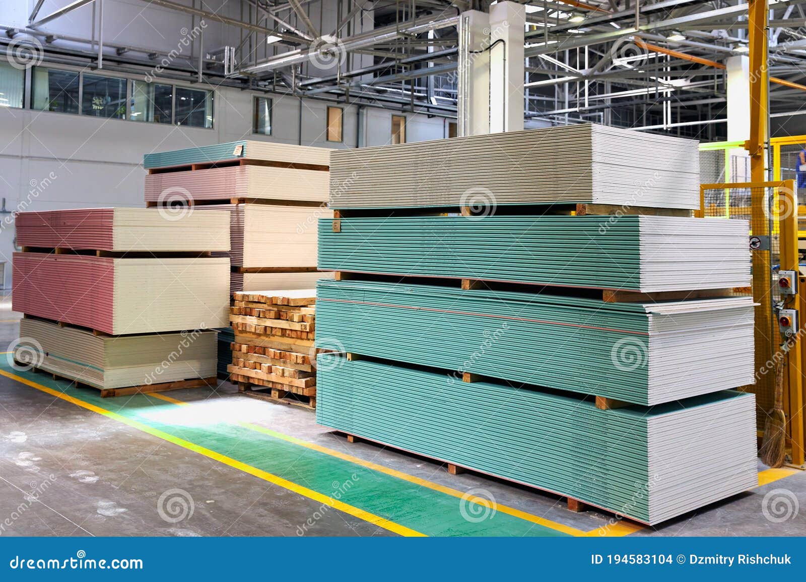 Gypsum Plasterboard in Pack. Pallet with Plasterboard in the Building