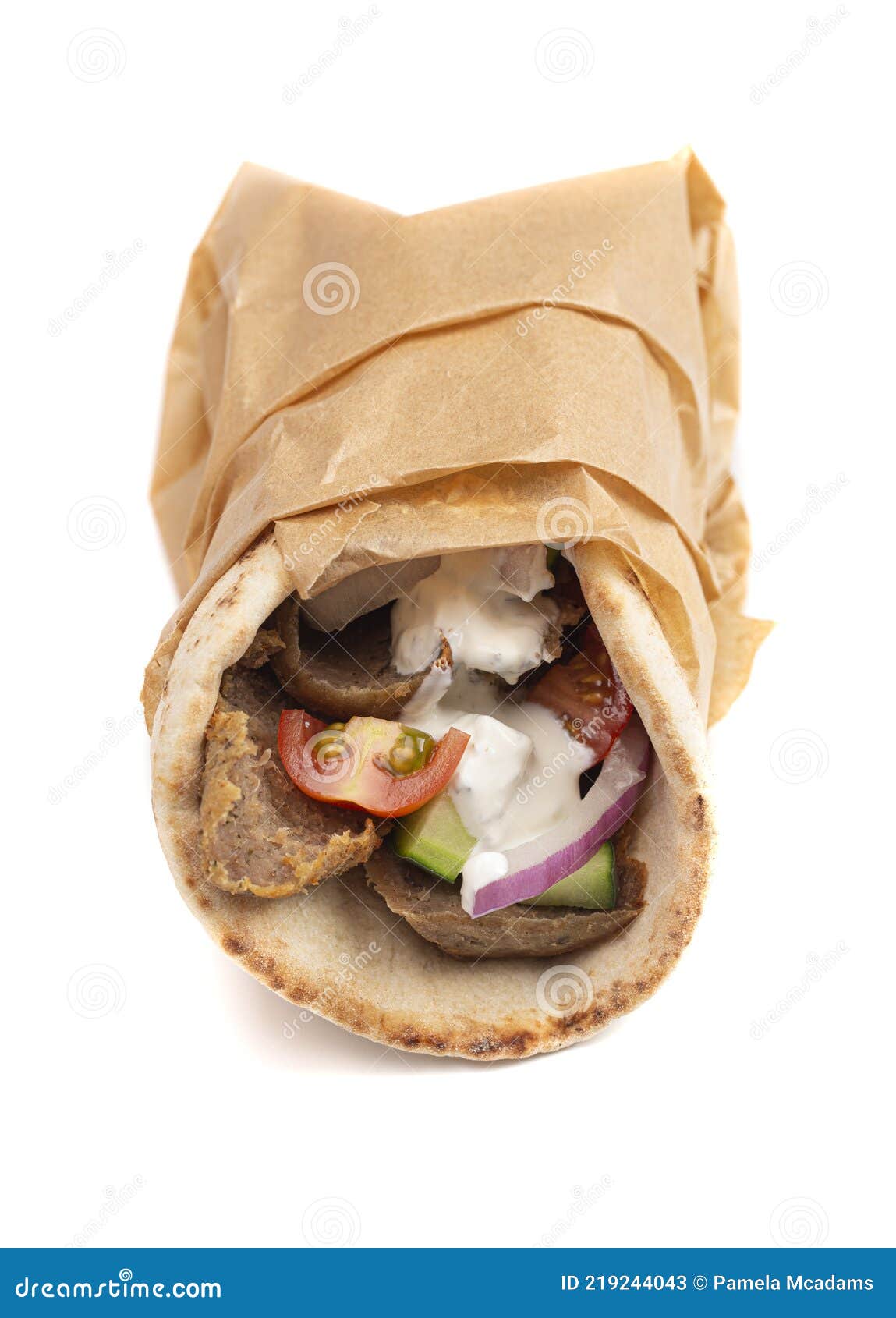 A Gyro with Vegetables and Garlic White Sauce on a White Background