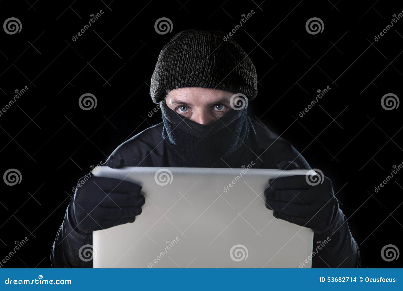 Hacker Man in Black Using Computer Laptop for Criminal Activity Hacking