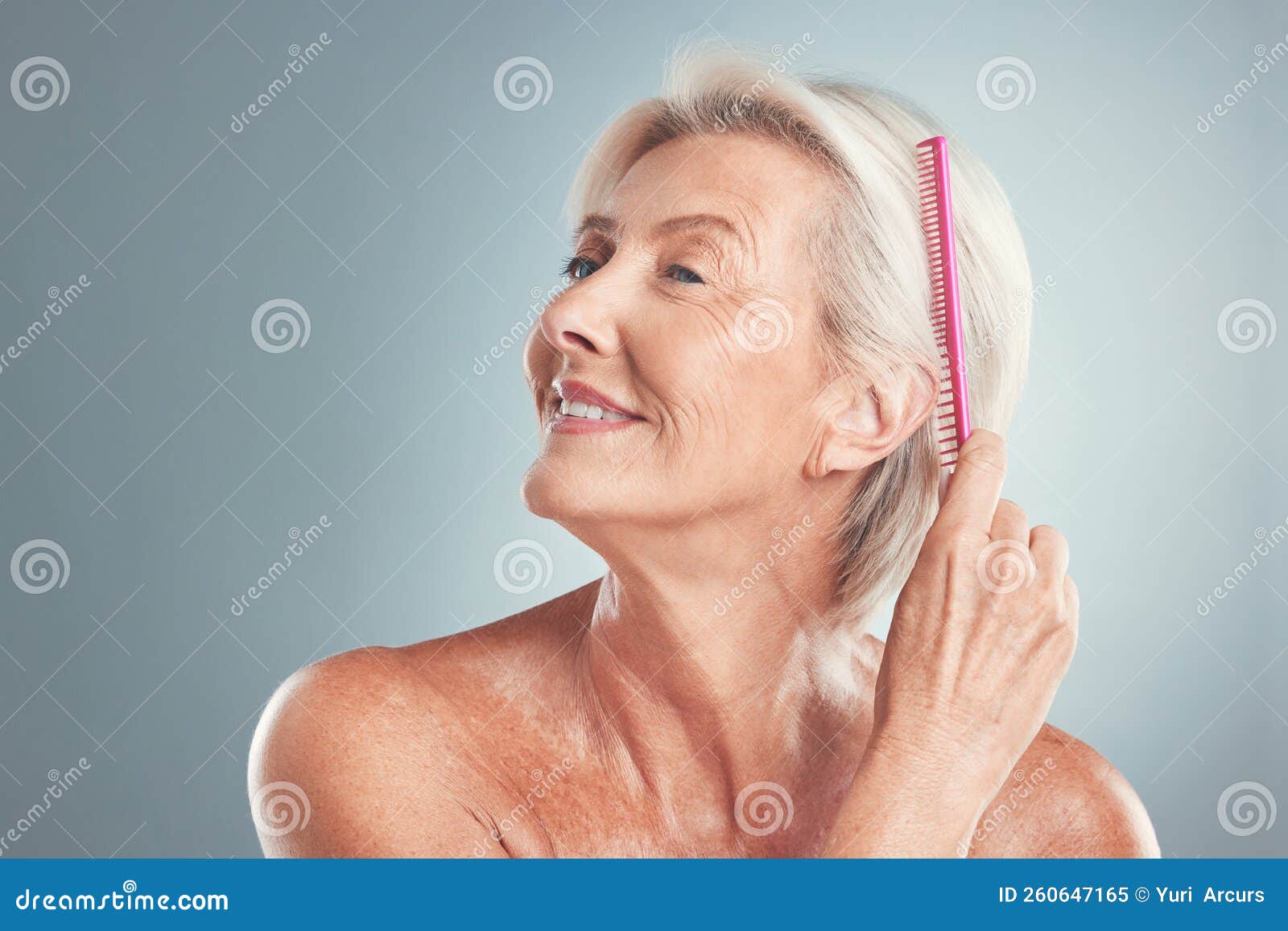 Hair, Beauty and Senior Woman Brushing Hair, Grooming and in Studio for