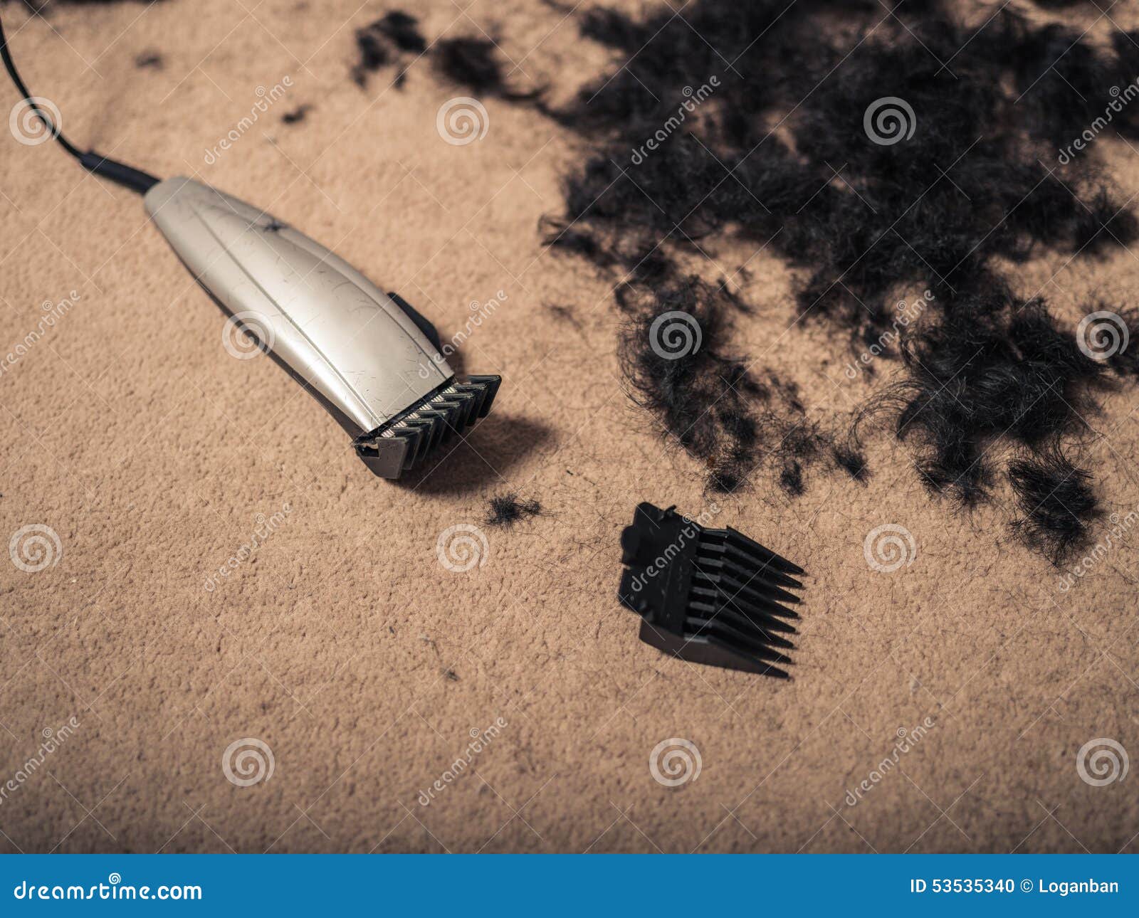 Hair Clippers Surrounded By Hair Stock Photo - Image of 