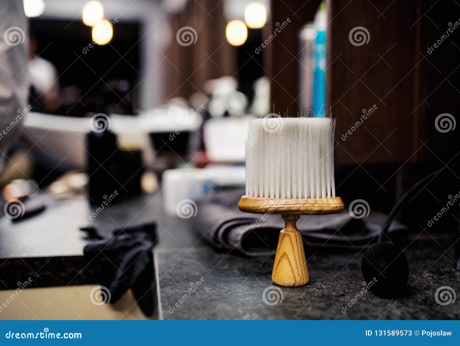 A Hair Dust Brush And Other Tools In Hair Salon For Men