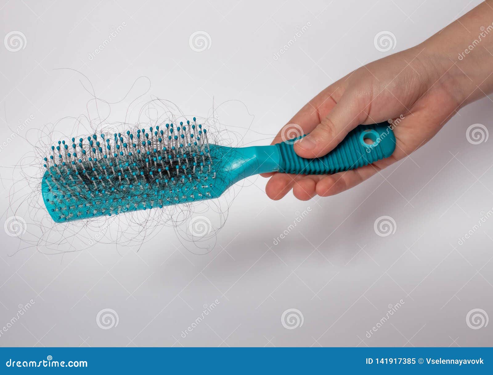 Hair Fall Out. Hairbrush with Hair on a White Background. Comb in Hand.  Stock Image - Image of full, background: 141917385