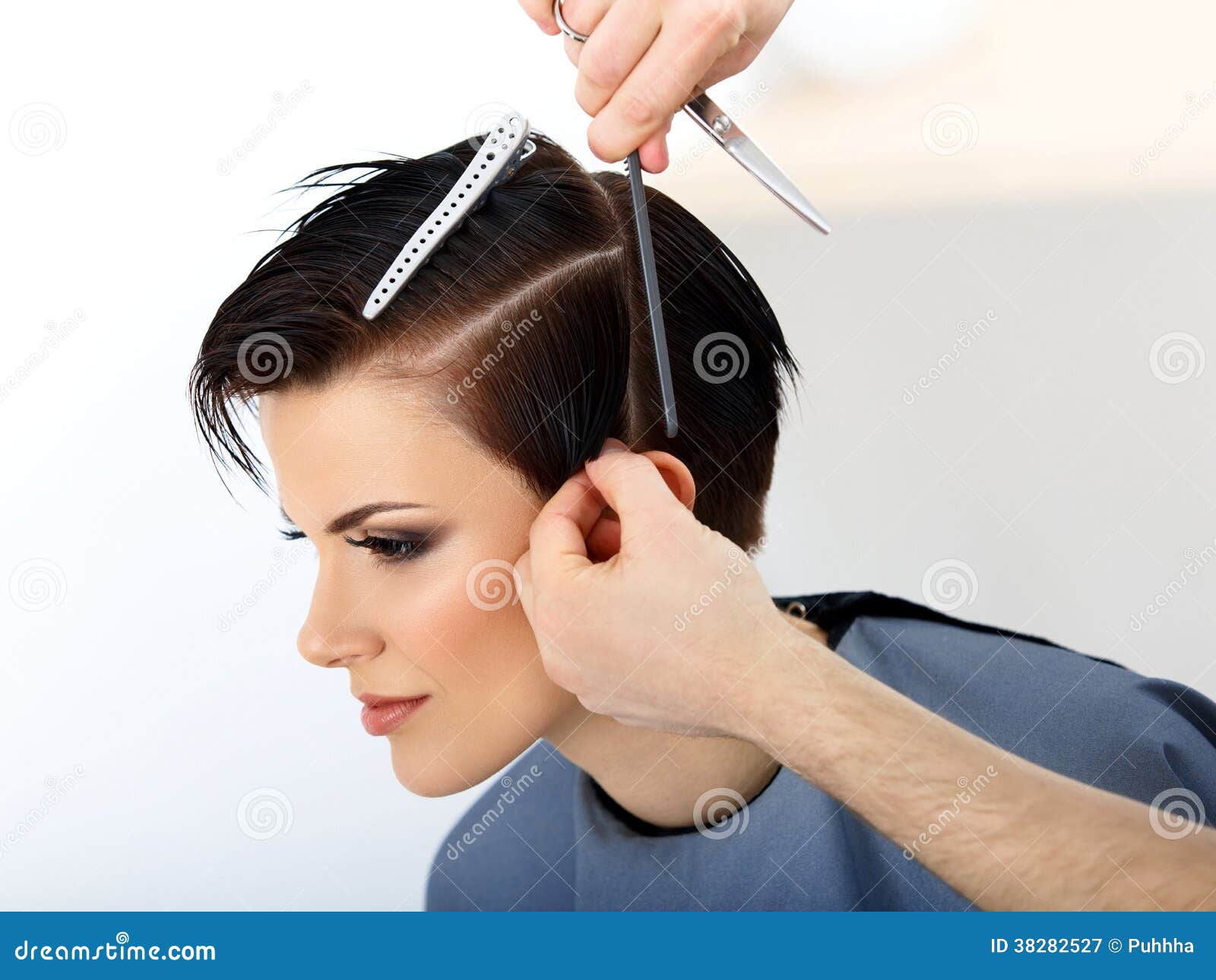 Hair. Hairdresser Cutting Womans Hair in Beauty Salon Stock Image