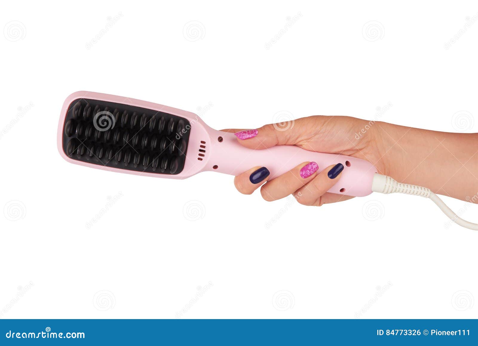 Hair straighteners in hand stock photo. Image of pink 84773326